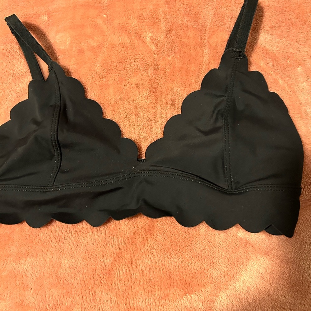 Scalloped black bra or lounge top with adjustable straps. Nylon & spandex. Small